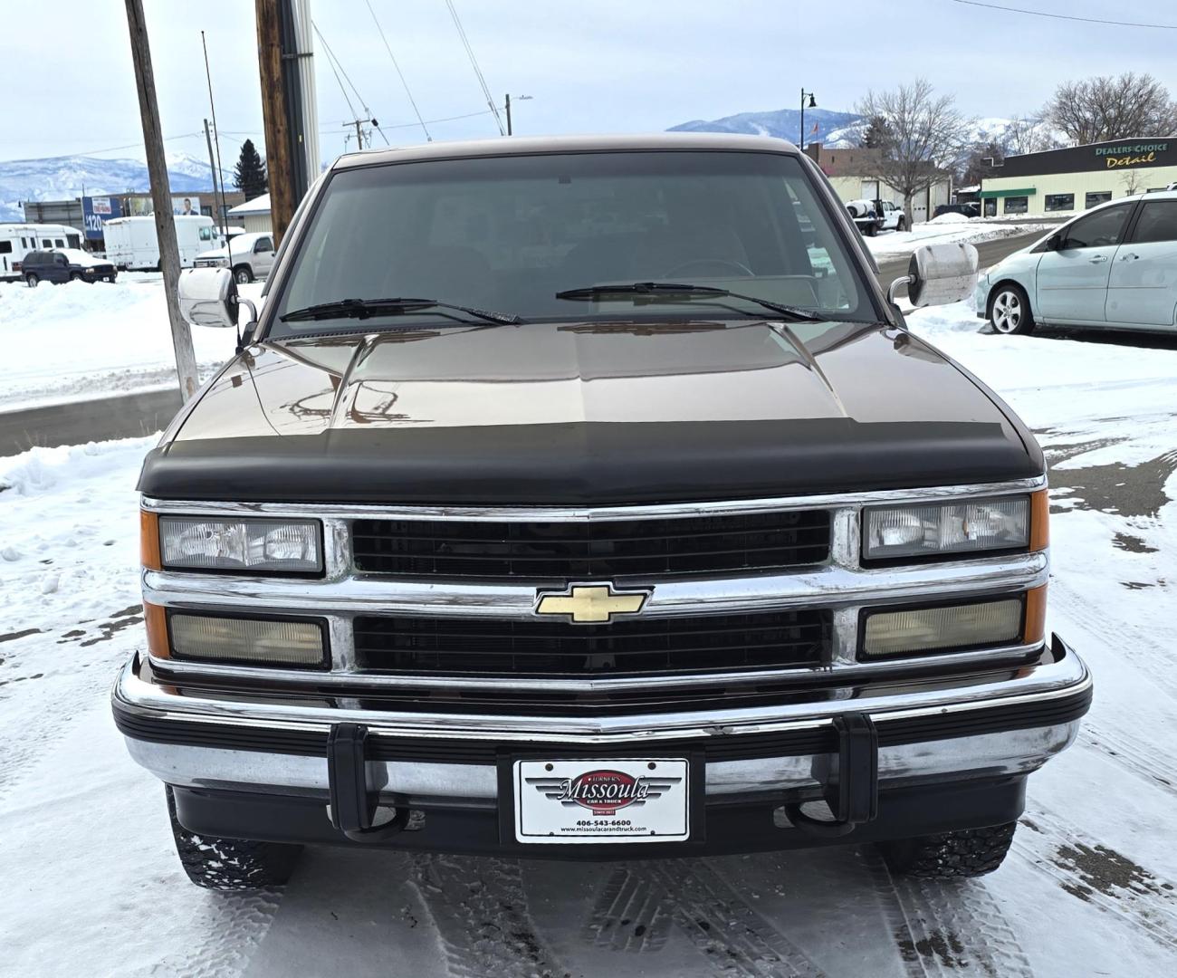 1994 Brown /Tan Chevrolet C/K 1500 Ext. Cab 6.5-ft. Bed 4WD (2GCEK19K0R1) with an 5.7L V8 OHV 16V engine, Automatic transmission, located at 450 N Russell, Missoula, MT, 59801, (406) 543-6600, 46.874496, -114.017433 - Beautiful old Chevy 4WD. 5.7L V8 Engine. Automatic Transmission. Air. Cruise. Tilt. Power Windows and Locks. Matching Topper. 2 Owner with a Clean Title and Carfax. Because of the age, our Credit Union does NOT offer financing on this vehicle. - Photo#5