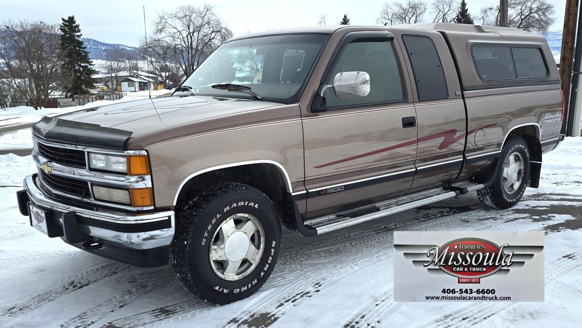 1994 Brown /Tan Chevrolet C/K 1500 Ext. Cab 6.5-ft. Bed 4WD (2GCEK19K0R1) with an 5.7L V8 OHV 16V engine, Automatic transmission, located at 450 N Russell, Missoula, MT, 59801, (406) 543-6600, 46.874496, -114.017433 - Beautiful old Chevy 4WD. 5.7L V8 Engine. Automatic Transmission. Air. Cruise. Tilt. Power Windows and Locks. Matching Topper. 2 Owner with a Clean Title and Carfax. Because of the age, our Credit Union does NOT offer financing on this vehicle. - Photo#2