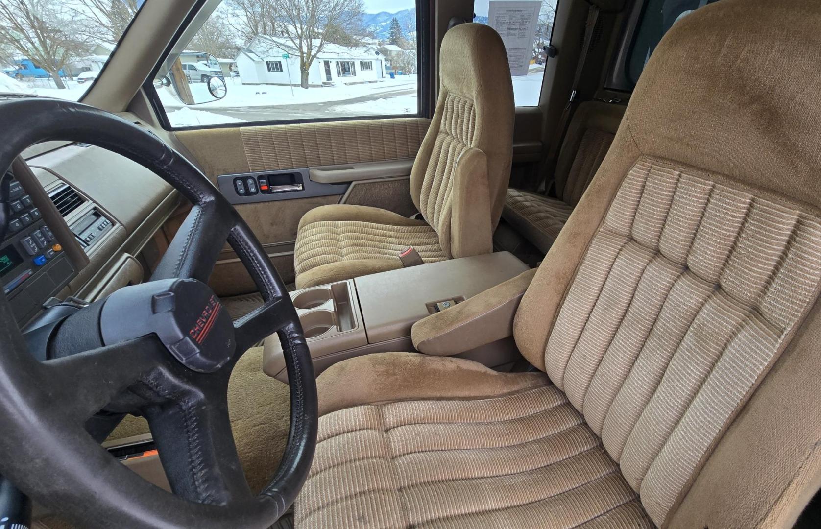 1994 Brown /Tan Chevrolet C/K 1500 Ext. Cab 6.5-ft. Bed 4WD (2GCEK19K0R1) with an 5.7L V8 OHV 16V engine, Automatic transmission, located at 450 N Russell, Missoula, MT, 59801, (406) 543-6600, 46.874496, -114.017433 - Beautiful old Chevy 4WD. 5.7L V8 Engine. Automatic Transmission. Air. Cruise. Tilt. Power Windows and Locks. Matching Topper. 2 Owner with a Clean Title and Carfax. Because of the age, our Credit Union does NOT offer financing on this vehicle. - Photo#13