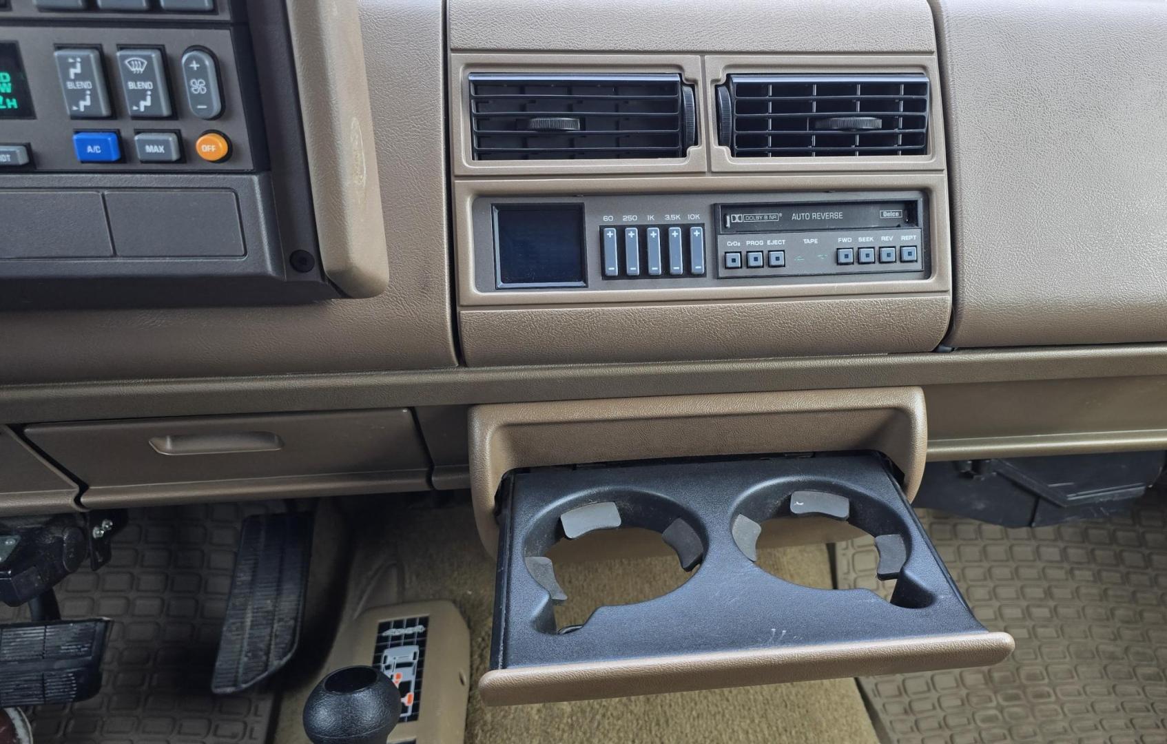 1994 Brown /Tan Chevrolet C/K 1500 Ext. Cab 6.5-ft. Bed 4WD (2GCEK19K0R1) with an 5.7L V8 OHV 16V engine, Automatic transmission, located at 450 N Russell, Missoula, MT, 59801, (406) 543-6600, 46.874496, -114.017433 - Beautiful old Chevy 4WD. 5.7L V8 Engine. Automatic Transmission. Air. Cruise. Tilt. Power Windows and Locks. Matching Topper. 2 Owner with a Clean Title and Carfax. Because of the age, our Credit Union does NOT offer financing on this vehicle. - Photo#15