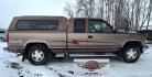 1994 Brown /Tan Chevrolet C/K 1500 Ext. Cab 6.5-ft. Bed 4WD (2GCEK19K0R1) with an 5.7L V8 OHV 16V engine, Automatic transmission, located at 450 N Russell, Missoula, MT, 59801, (406) 543-6600, 46.874496, -114.017433 - Beautiful old Chevy 4WD. 5.7L V8 Engine. Automatic Transmission. Air. Cruise. Tilt. Power Windows and Locks. Matching Topper. 2 Owner with a Clean Title and Carfax. Because of the age, our Credit Union does NOT offer financing on this vehicle. - Photo#1