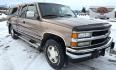 1994 Brown /Tan Chevrolet C/K 1500 Ext. Cab 6.5-ft. Bed 4WD (2GCEK19K0R1) with an 5.7L V8 OHV 16V engine, Automatic transmission, located at 450 N Russell, Missoula, MT, 59801, (406) 543-6600, 46.874496, -114.017433 - Beautiful old Chevy 4WD. 5.7L V8 Engine. Automatic Transmission. Air. Cruise. Tilt. Power Windows and Locks. Matching Topper. 2 Owner with a Clean Title and Carfax. Because of the age, our Credit Union does NOT offer financing on this vehicle. - Photo#3