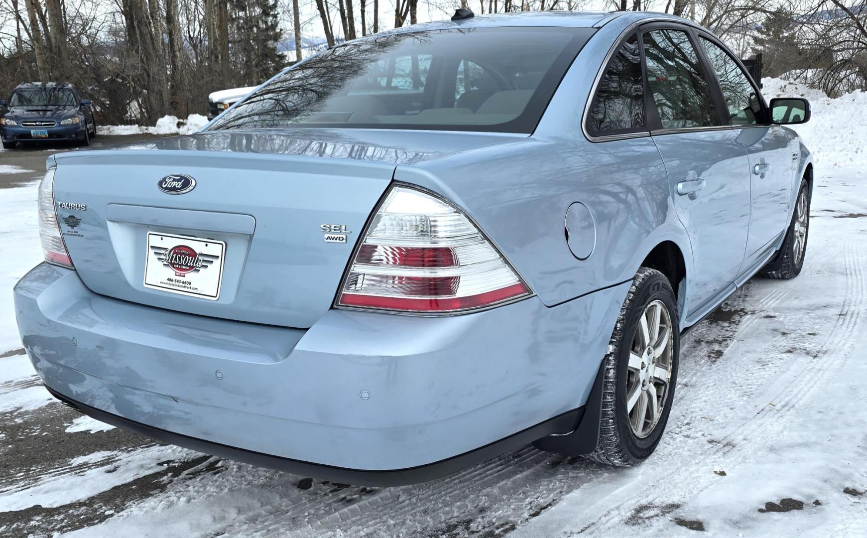 2008 Blue /Tan Ford Taurus SEL AWD (1FAHP27W98G) with an 3.5L V6 DOHC 24V engine, 6-Speed Automatic Overdrive transmission, located at 450 N Russell, Missoula, MT, 59801, (406) 543-6600, 46.874496, -114.017433 - Very Clean 2 Owner AWD Sedan. Only 78K Miles. 3.5L V6 Engine. Power Front Seats. Air. Cruise. Tilt. Power Windows and Locks. AM FM CD Player. - Photo#6