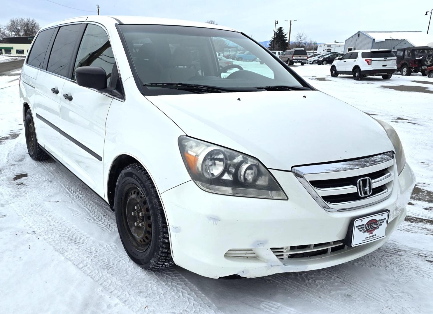 2007 White /Tan Honda Odyssey LX (5FNRL38247B) with an 3.5L V6 SOHC 24V engine, 5-Speed Automatic Overdrive transmission, located at 450 N Russell, Missoula, MT, 59801, (406) 543-6600, 46.874496, -114.017433 - Excellent Running Honda Minivan. FWD. 3.5L V6 Engine. 3rd Row Seating. Air. Cruise. Tilt. Power Windows and Locks. - Photo#3