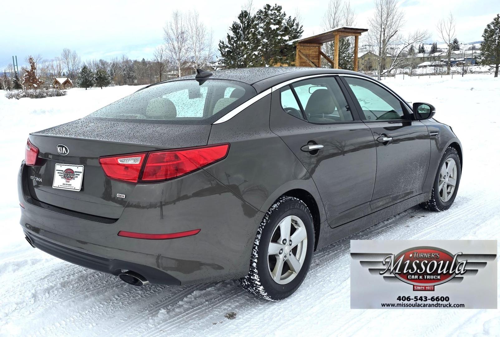 2015 Bronze /Black Kia Optima LX (5XXGM4A70FG) with an 2.4L L4 DOHC 16V engine, 6-Speed Automatic transmission, located at 450 N Russell, Missoula, MT, 59801, (406) 543-6600, 46.874496, -114.017433 - Photo#1