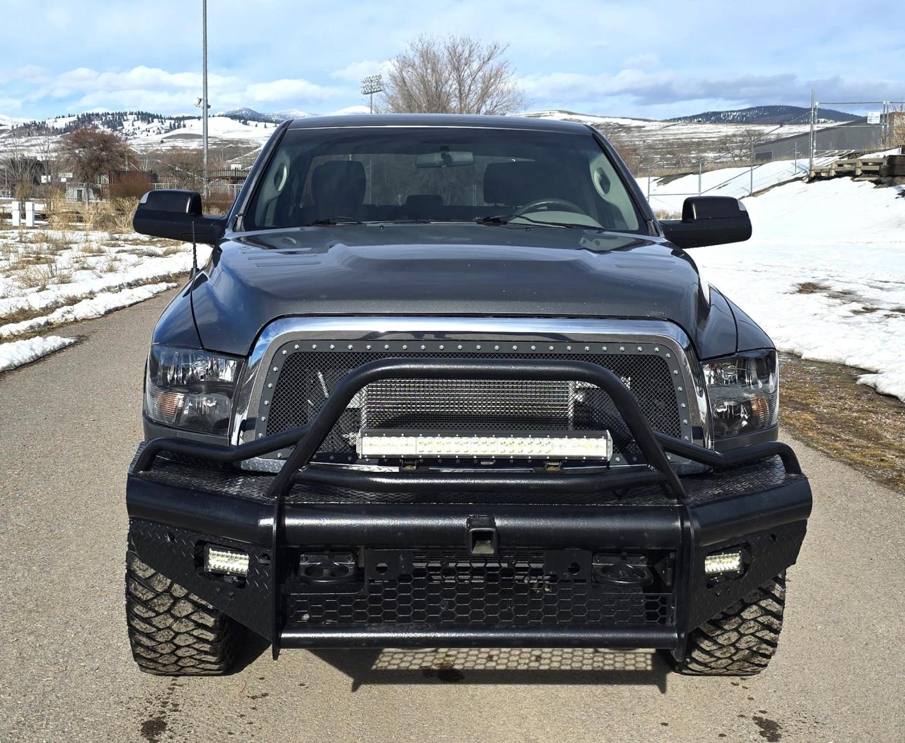 2012 Grey /Gray Dodge Ram 3500 ST Crew Cab LWB 4WD (3C63D3GL5CG) with an 6.7L L6 OHV 24V TURBO DIESEL engine, 6-Speed Automatic transmission, located at 450 N Russell, Missoula, MT, 59801, (406) 543-6600, 46.874496, -114.017433 - Looking for a Stud Truck? Here it is. Ram One Ton 4WD with a 6.7 Cummins Diesel Engine and a 6 Speed Manual Transmission (RARE).Light Bar Kit. Monster Grill Guard. After,marker Wheels with Beefy Tires. Power Windows and Locks. Built in Towing. Air. Cruise. Tilt. AM FM Bluetooth. - Photo#3