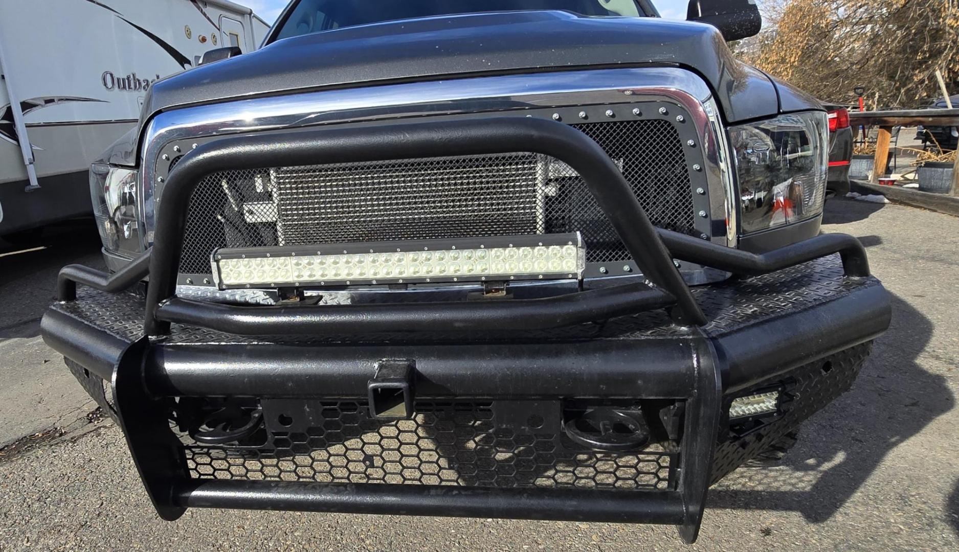 2012 Grey /Gray Dodge Ram 3500 ST Crew Cab LWB 4WD (3C63D3GL5CG) with an 6.7L L6 OHV 24V TURBO DIESEL engine, 6-Speed Automatic transmission, located at 450 N Russell, Missoula, MT, 59801, (406) 543-6600, 46.874496, -114.017433 - Looking for a Stud Truck? Here it is. Ram One Ton 4WD with a 6.7 Cummins Diesel Engine and a 6 Speed Manual Transmission (RARE).Light Bar Kit. Monster Grill Guard. After,marker Wheels with Beefy Tires. Power Windows and Locks. Built in Towing. Air. Cruise. Tilt. AM FM Bluetooth. - Photo#14