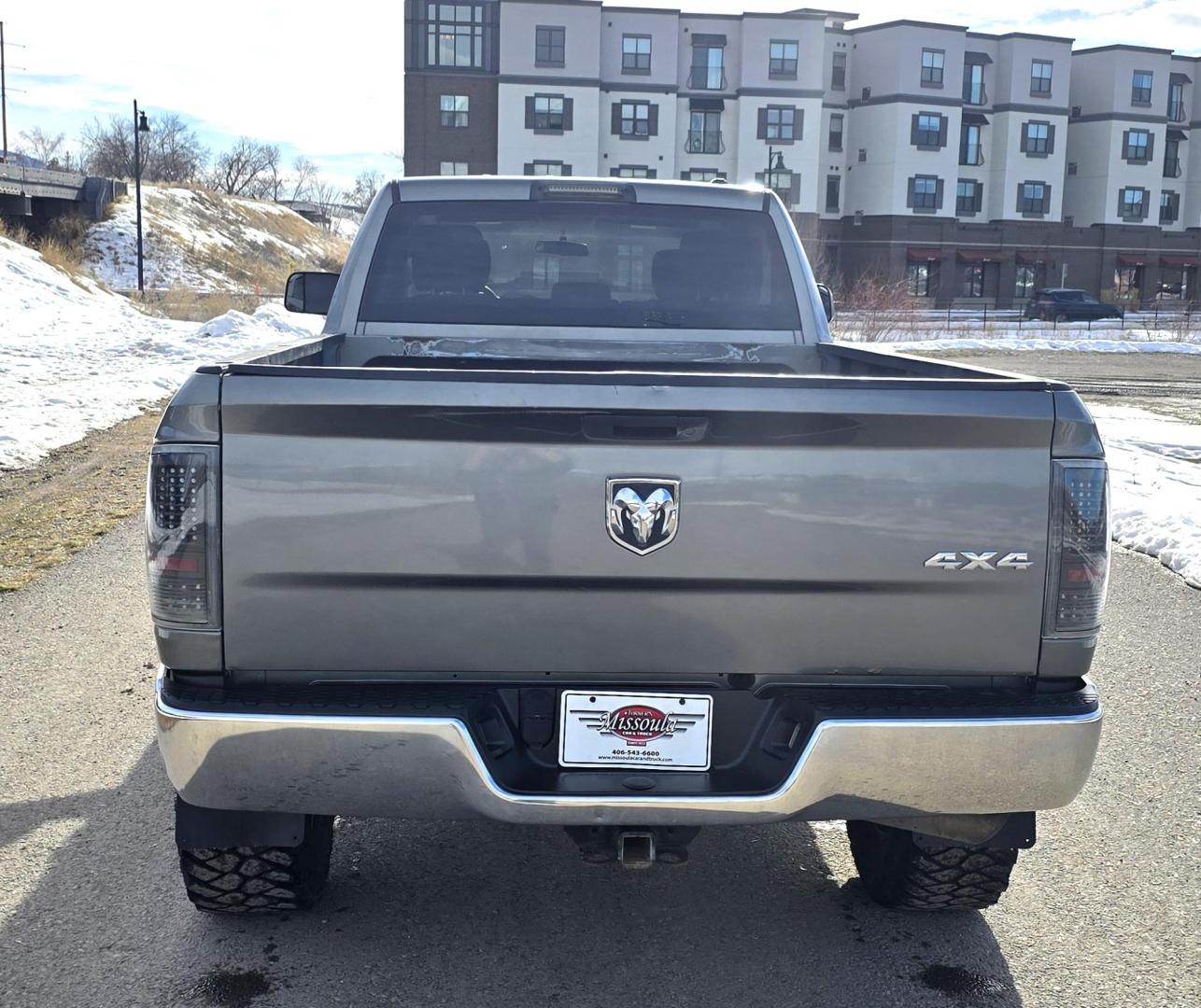 2012 Grey /Gray Dodge Ram 3500 ST Crew Cab LWB 4WD (3C63D3GL5CG) with an 6.7L L6 OHV 24V TURBO DIESEL engine, 6-Speed Automatic transmission, located at 450 N Russell, Missoula, MT, 59801, (406) 543-6600, 46.874496, -114.017433 - Looking for a Stud Truck? Here it is. Ram One Ton 4WD with a 6.7 Cummins Diesel Engine and a 6 Speed Manual Transmission (RARE).Light Bar Kit. Monster Grill Guard. After,marker Wheels with Beefy Tires. Power Windows and Locks. Built in Towing. Air. Cruise. Tilt. AM FM Bluetooth. - Photo#6