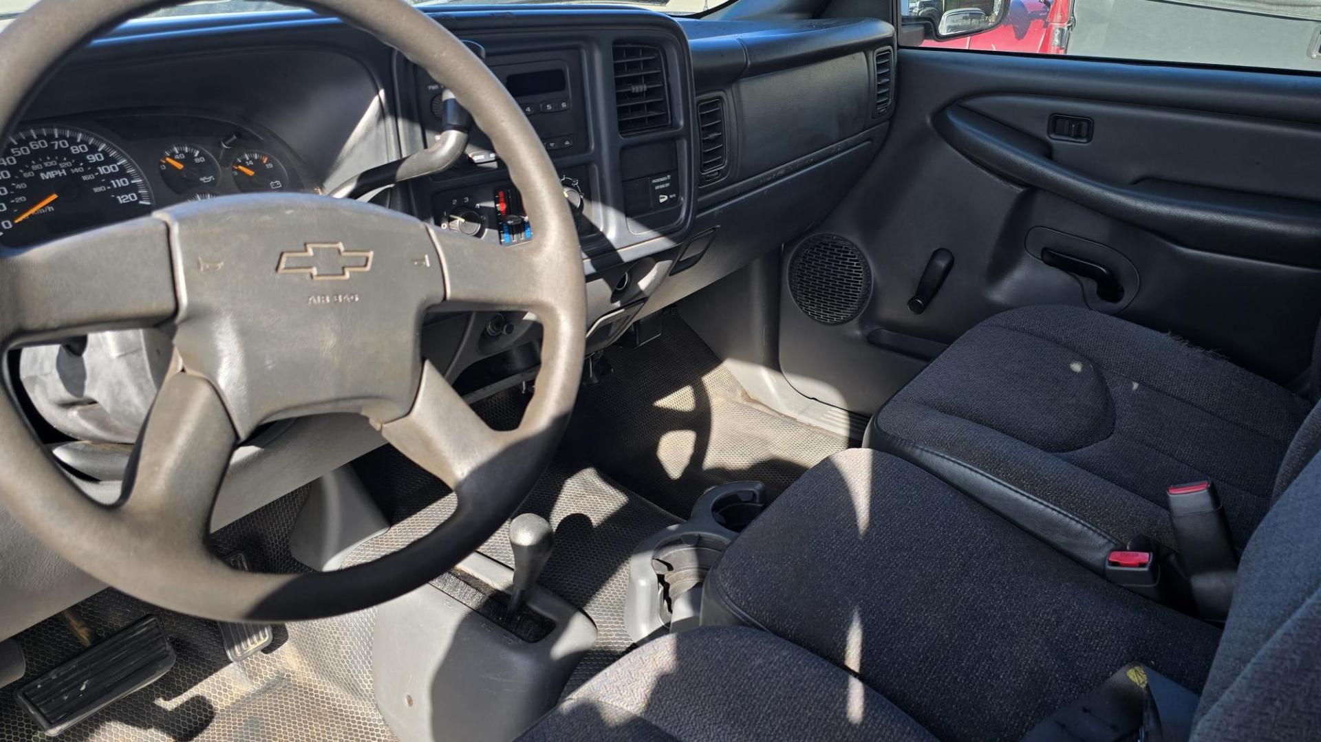 2003 White /Gray Chevrolet Silverado 1500 Long Bed 4WD (1GCEK14X73Z) with an 4.3L V6 OHV 12V engine, Automatic transmission, located at 450 N Russell, Missoula, MT, 59801, (406) 543-6600, 46.874496, -114.017433 - Work Truck that's ready for you.Strong Running 4.3 V6 Engine. 4WD. Automatic. Nice Flatbed with Tool Boxes on the side. Ladder / Lumber Rack. Gooseneck ball. Heavy Duty Rear Bumper for towing. Front Grill Guard. Air.Conditioning. Good Cooper Tires. Financing is NOT Available. - Photo#13