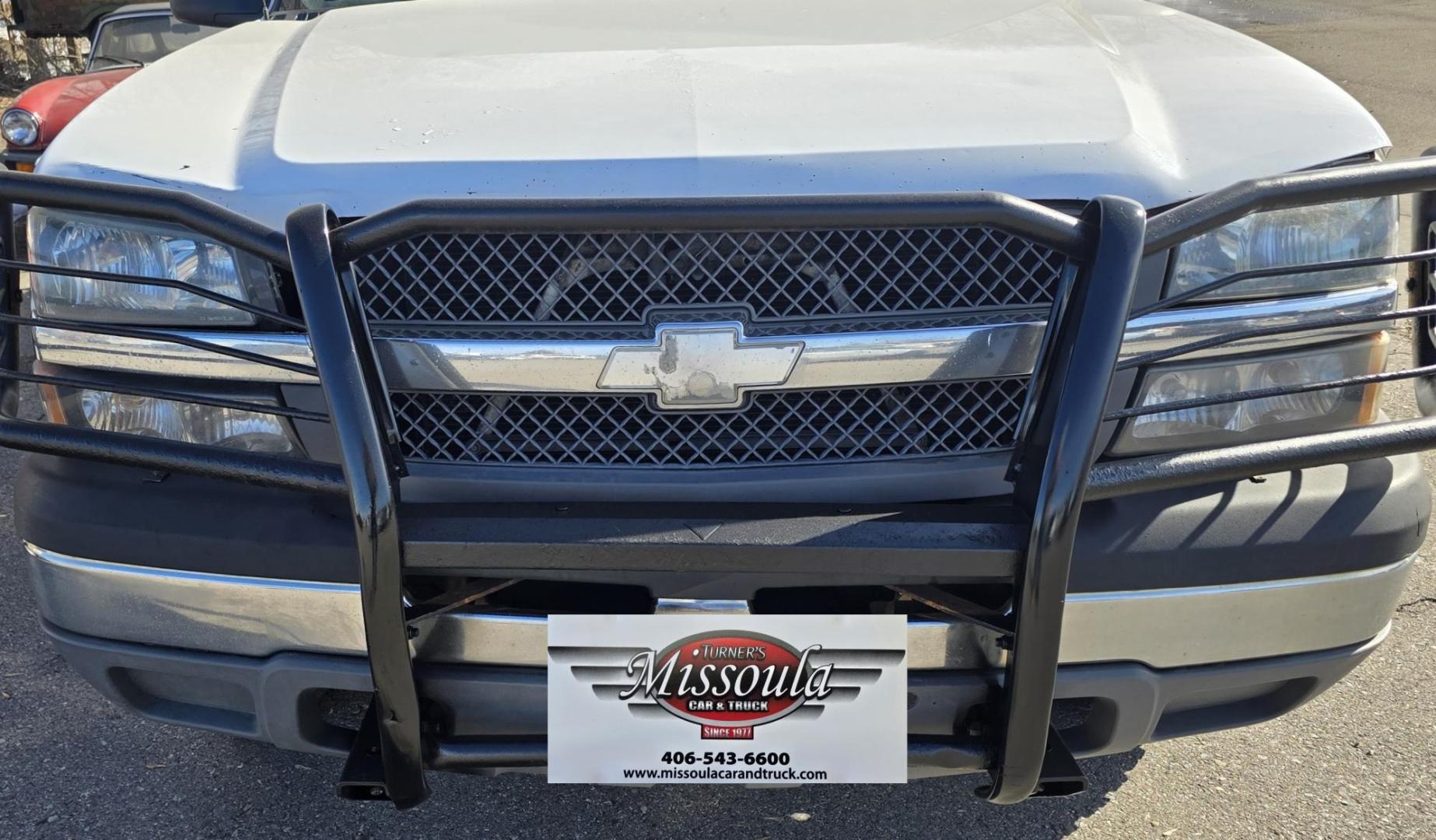 2003 White /Gray Chevrolet Silverado 1500 Long Bed 4WD (1GCEK14X73Z) with an 4.3L V6 OHV 12V engine, Automatic transmission, located at 450 N Russell, Missoula, MT, 59801, (406) 543-6600, 46.874496, -114.017433 - Work Truck that's ready for you.Strong Running 4.3 V6 Engine. 4WD. Automatic. Nice Flatbed with Tool Boxes on the side. Ladder / Lumber Rack. Gooseneck ball. Heavy Duty Rear Bumper for towing. Front Grill Guard. Air.Conditioning. Good Cooper Tires. Financing is NOT Available. - Photo#17