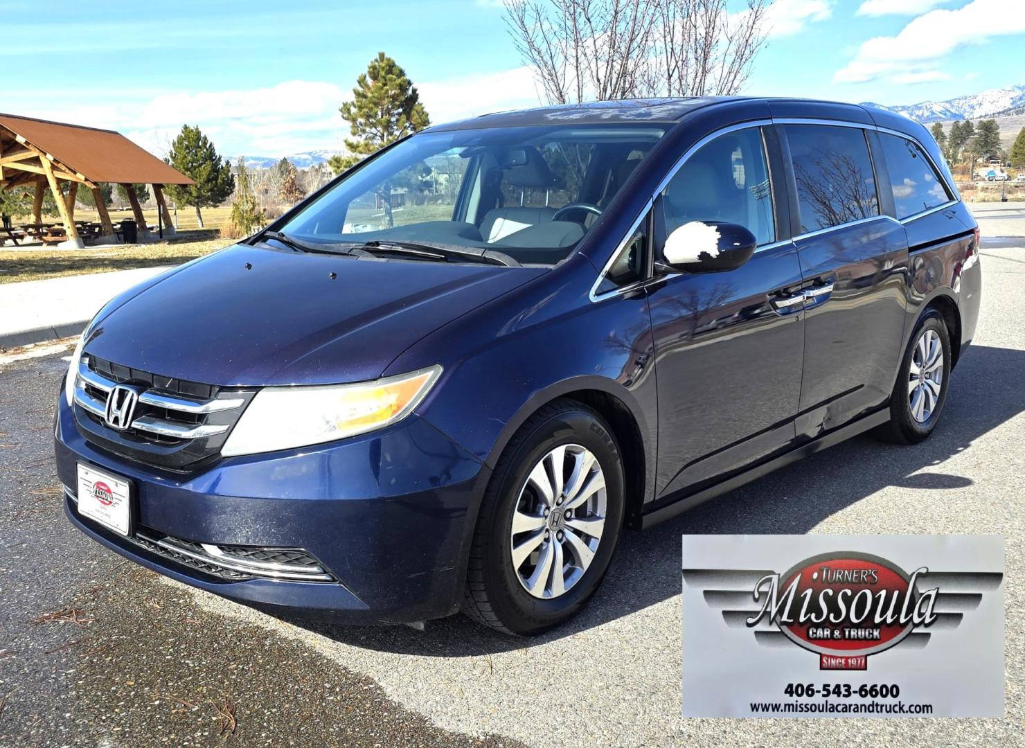 2014 Blue /Tan Honda Odyssey EX-L (5FNRL5H69EB) with an 3.5L V6 SOHC 24V engine, 6-Speed Automatic transmission, located at 450 N Russell, Missoula, MT, 59801, (406) 543-6600, 46.874496, -114.017433 - 3.5L V6 Engine. Automatic Transmission. 3rd Row Seating. Air. Cruise. Tilt. Power Sunroof. Heated Seats. Power Front Seats. Air. Cruise. Tilt. Power Sliding Doors. Backup Camera. - Photo#2