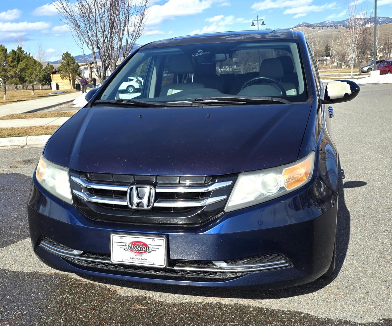 2014 Blue /Tan Honda Odyssey EX-L (5FNRL5H69EB) with an 3.5L V6 SOHC 24V engine, 6-Speed Automatic transmission, located at 450 N Russell, Missoula, MT, 59801, (406) 543-6600, 46.874496, -114.017433 - 3.5L V6 Engine. Automatic Transmission. 3rd Row Seating. Air. Cruise. Tilt. Power Sunroof. Heated Seats. Power Front Seats. Air. Cruise. Tilt. Power Sliding Doors. Backup Camera. - Photo#3