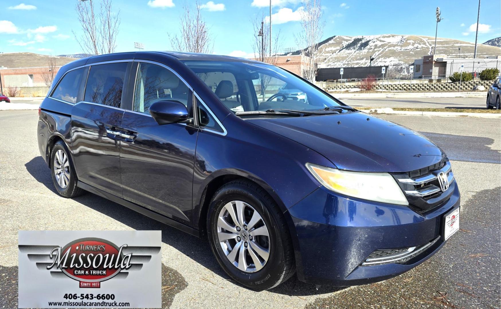 2014 Blue /Tan Honda Odyssey EX-L (5FNRL5H69EB) with an 3.5L V6 SOHC 24V engine, 6-Speed Automatic transmission, located at 450 N Russell, Missoula, MT, 59801, (406) 543-6600, 46.874496, -114.017433 - 3.5L V6 Engine. Automatic Transmission. 3rd Row Seating. Air. Cruise. Tilt. Power Sunroof. Heated Seats. Power Front Seats. Air. Cruise. Tilt. Power Sliding Doors. Backup Camera. - Photo#4