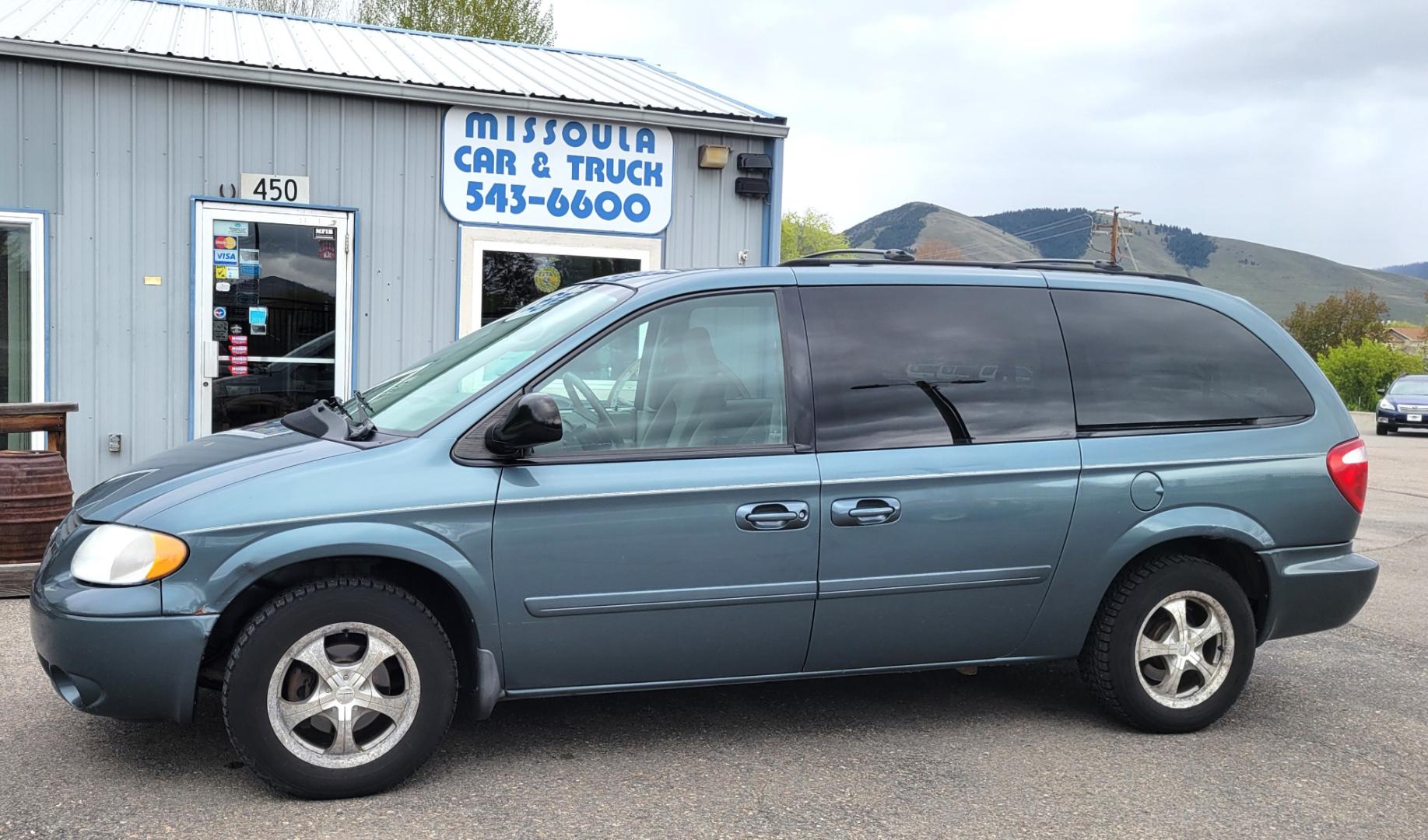 2006 Sage /Grey Cloth Dodge Grand Caravan SXT (2D4GP44L56R) with an 3.8L V6 SFI engine, 4 Speed Automatic transmission, located at 450 N Russell, Missoula, MT, 59801, (406) 543-6600, 46.874496, -114.017433 - Great running FWD Minivan. Only 103K Miles. 2 Sets of Tires and Wheels (Winter and Summer) 3rd Row Seating. Front and Rear Air Conditioning. Cruise Control. 3.8L V6 Engine. Automatic Transmission. Power Windows and Locks. AM FM CD. - Photo#0